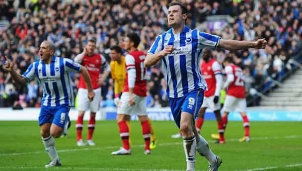 Brighton player sees red for tripping the referee