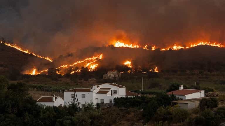 Parts of Spain and France devastated by wildfire