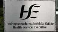 The HSE logo on a building, illustrating the story on HSE staff overpayments