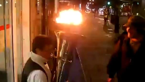 Video: Busker with a flaming tuba
