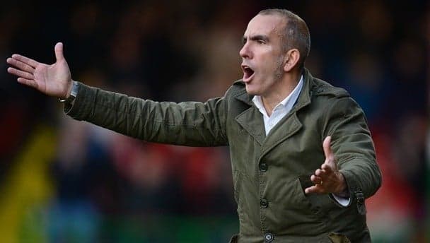 Di Canio sneaks back into his Swindon office to steal pictures