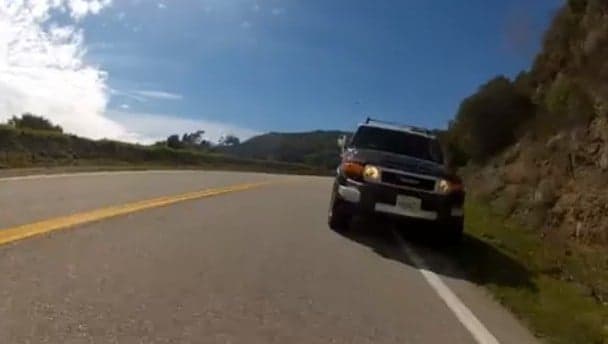 Video: Biker narrowly avoids being killed by reckless 4×4 driver