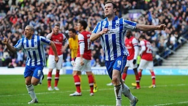 Brighton player sees red for tripping the referee