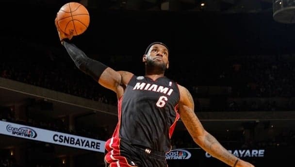 LeBron James doing what LeBron James does best in record equalling victory