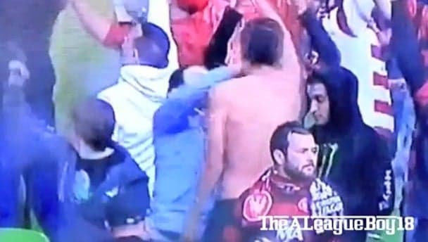 Aussie fan lays out another supporter in the crowd