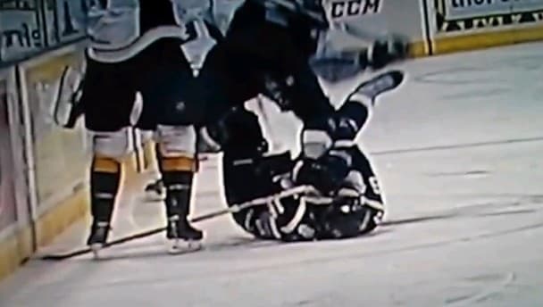 Video: Ice hockey player gets hit with a stick and then with a skate in the face