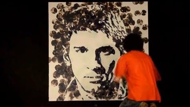 Video: Artist paints a brilliant Messi portrait with a football
