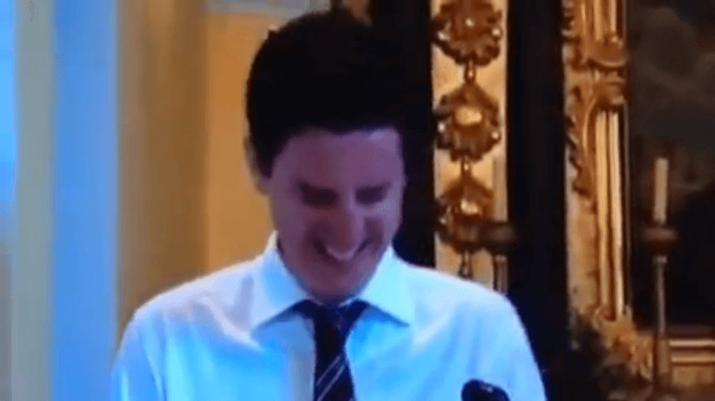 Video: Irish lad comes down with a fit of the giggles during mass