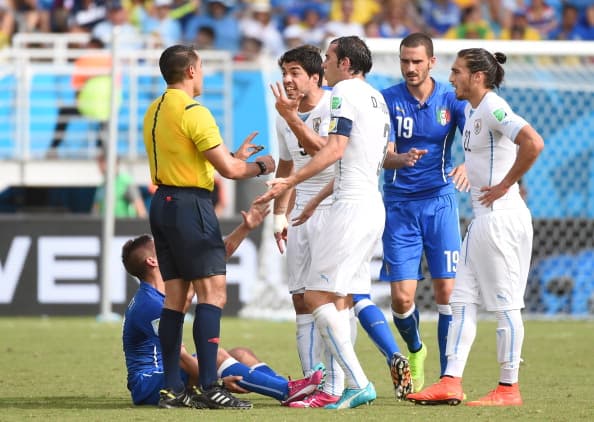 Was it a bite? Twitter has its say after Luis Suarez gets up close and personal with Giorgio Chiellini