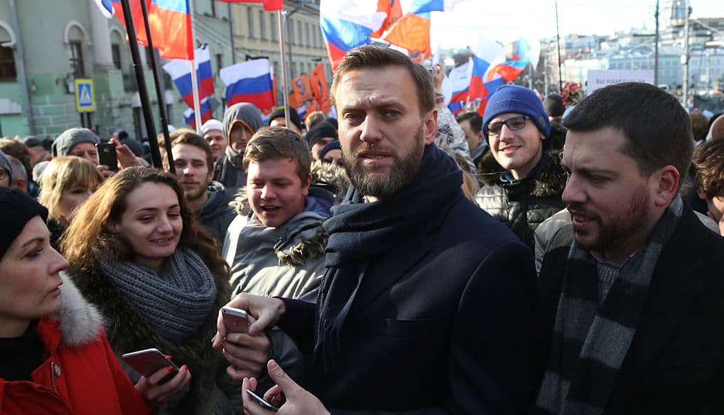 Russian opposition leader Alexei Navalny out of induced coma and is responsive, doctors say