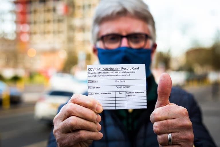 Graphic designer reveals request to forge 250 vaccination cards