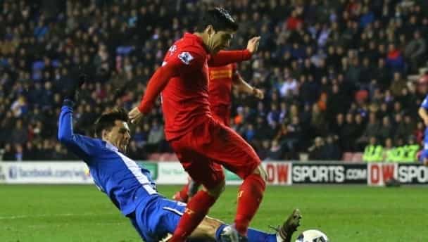 Video: Luis Suarez puts the boot in (mildly) on Liverpool ladies player in training Video: Luis Suarez puts the boot in (mildly) on Liverpool ladies player in training