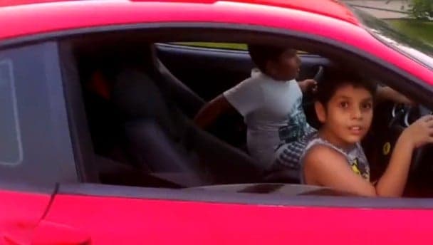 Video: Young kids casually drive a €200,000 Ferrari F430 Video: Young kids casually drive a €200,000 Ferrari F430