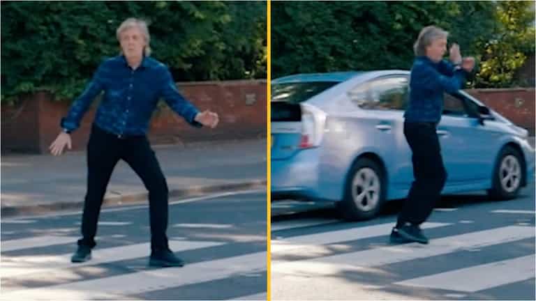 Close call as Paul McCartney tries to pose on Abbey Road crossing Close call as Paul McCartney tries to pose on Abbey Road crossing