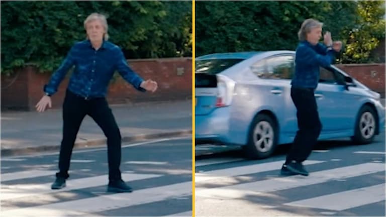 Close call as Paul McCartney tries to pose on Abbey Road crossing Close call as Paul McCartney tries to pose on Abbey Road crossing