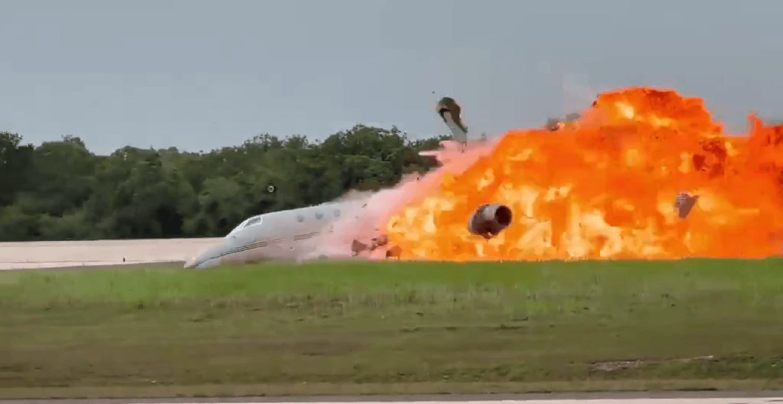 Plane erupts in huge fireball following emergency landing