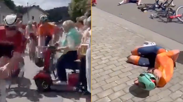 Horrific moment pensioner in mobility scooter causes spectacular crash during cycling race Horrific moment pensioner in mobility scooter causes spectacular crash during cycling race