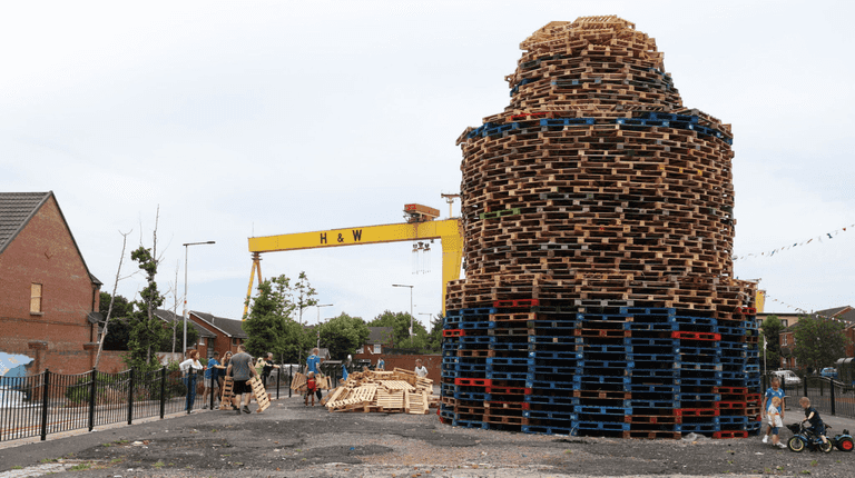 Man killed after fall from 12th of July bonfire in Belfast Man killed after fall from 12th of July bonfire in Belfast