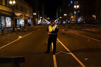 Chilling photo of Boston bombing suspect with sniper target trained on his head
