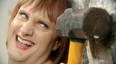 Video: Joan Burton sings about the state of the nation while straddling a wrecking ball