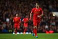 Picture: Luis Suarez stops to play football in the park with young fan who has Down Syndrome