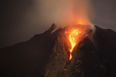 Pics: Indonesian volcanic eruption throws absolutely massive cloud of ash into the sky