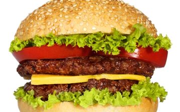 Pic: Cheesus! Would you be man enough to take on this three-tier, 10,000 calorie cheeseburger?