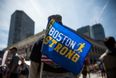Pics: Exhausted Boston Marathon runner helped across the line by his competitors