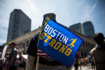 Pics: Exhausted Boston Marathon runner helped across the line by his competitors