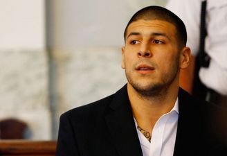 Former New England Patriot Aaron Hernandez indicted for double murder in 2012