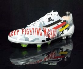 Pic: Lukas Podolksi to show support for Michael Schumacher with these boots at Wembley today