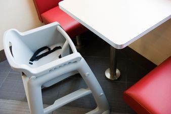 Video: This video of a man getting stuck in a child’s highchair is absolutely priceless