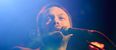 Which Premier League striker was filmed crowd surfing at a Kasabian gig?