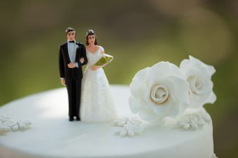 Pic: Groom accidentally rips bride’s dress and his reaction says it all