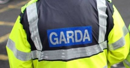 PIC: Gardai open investigation after car driven into Dublin gym and set alight