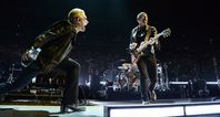 Video: U2 joined on stage in New York by Chilean woman wearing Dublin jersey