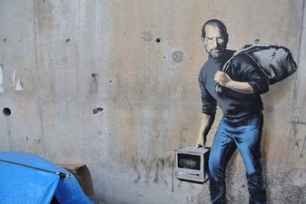 VIDEO: Banksy paints mural on the side of a primary school and the kids love it