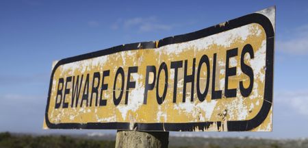 PICS: Giant Cork pothole attempts to swallow Renault whole