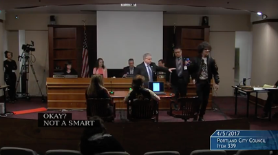 WATCH: Protestor tries to diffuse a tense meeting with a can of Pepsi, and it doesn’t end well