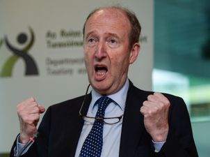 Minister Shane Ross congratulates Sanita Puspure on gold medal win, but manages to get her name wrong