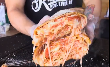 WATCH: Do you think you could take down this giant pizza-burrito?