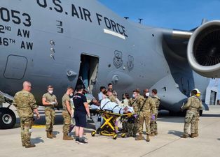 An Afghan woman has given birth on a US military flight to Germany