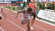Athlete wins 400m hurdle race despite penis repeatedly falling out of shorts